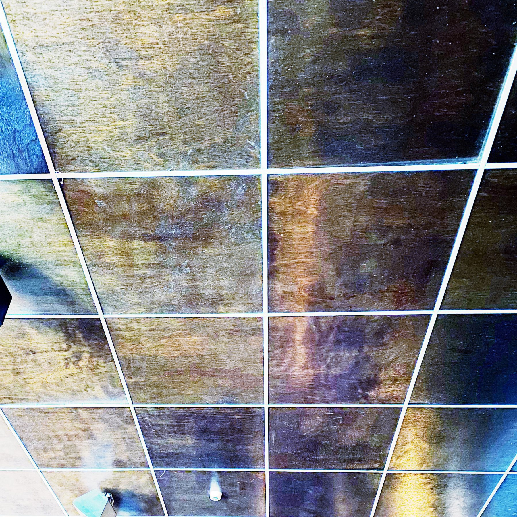 Twenty four ceiling tiles